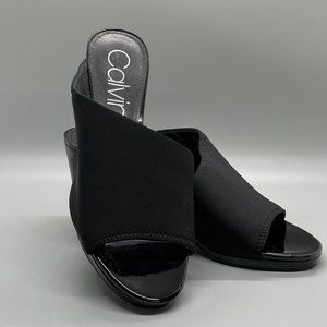 Calvin Klein Women's Open Toe Patent Leather Crib Sandals with Strap and Logo.